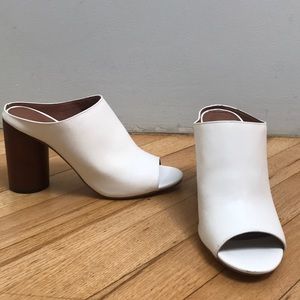 Urban Outfitters white leather mules